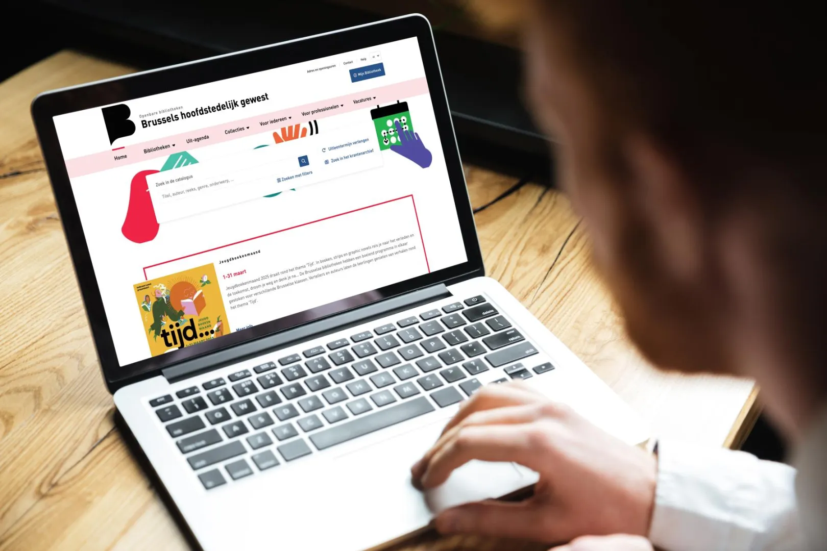 Person viewing the website on a laptop