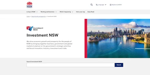 Screenshot of the primary banner of the Investment NSW homepage, showing an image of Sydney Harbour