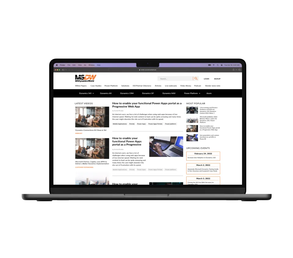 A laptop screen presents the MSDW website, showing a Droptica case study focused on Drupal migration.