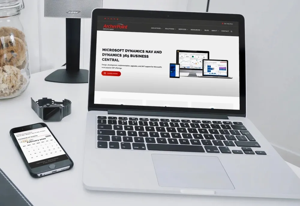 image of archerpoint's homepage on a laptop