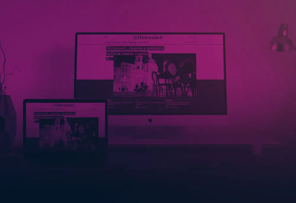 The ilgiornale.it news site on desktop and laptop, built by SparkFabrik