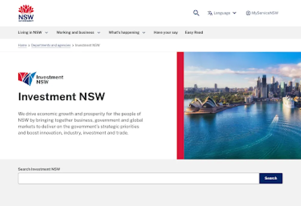 Screenshot of the primary banner of the Investment NSW homepage, showing an image of Sydney Harbour