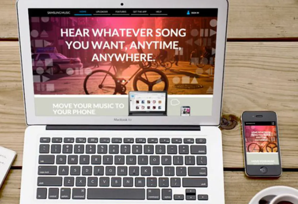 Samsungmusic.com displayed on a laptop and mobile phone