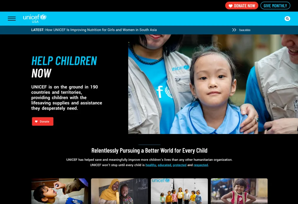 UNICEF USA Homepage with dark background, features picture of children