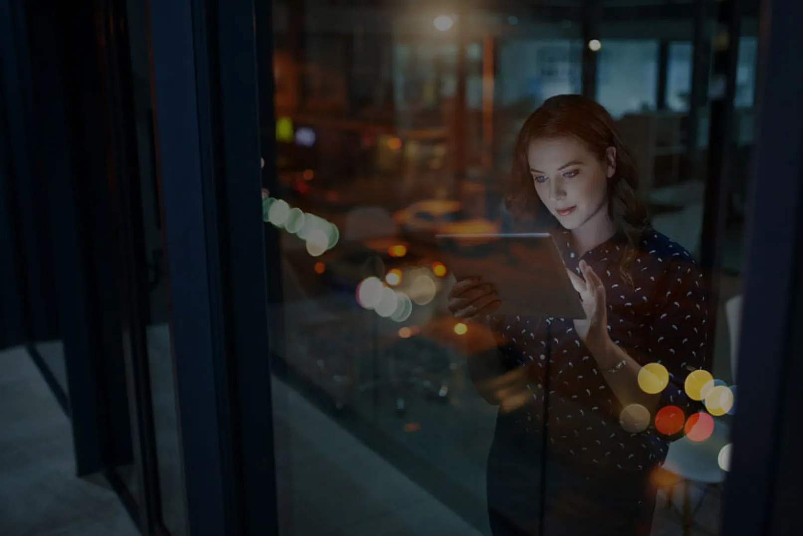 A stock photo of a woman using technology